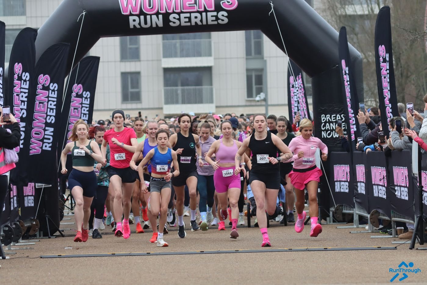 The mass start under the Women's Run Series arch at Queen Elizabeth Olympic Park, March 2026